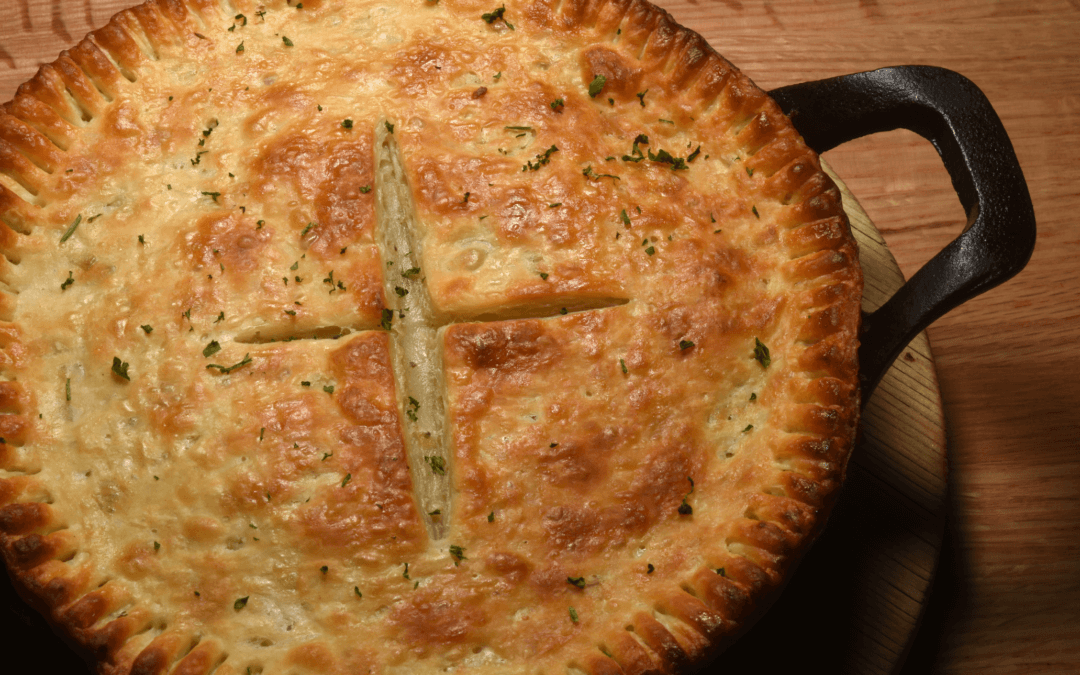 Chicken Pot pie close up in a cast iron pan